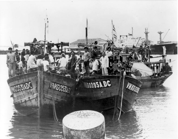 Vietnamese boat people arrive in Darwin Harbour in 1977.