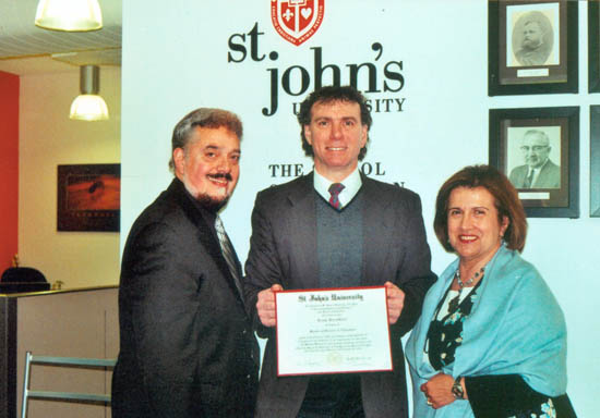 Frank Borzellieri receives the Excellence in Leadership Award for School Administration from St. John's University.
