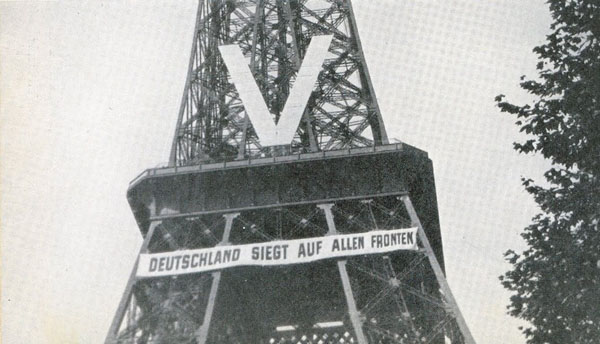 "Germany triumphs on all fronts." Eiffel Tower under German occupation, 1940.