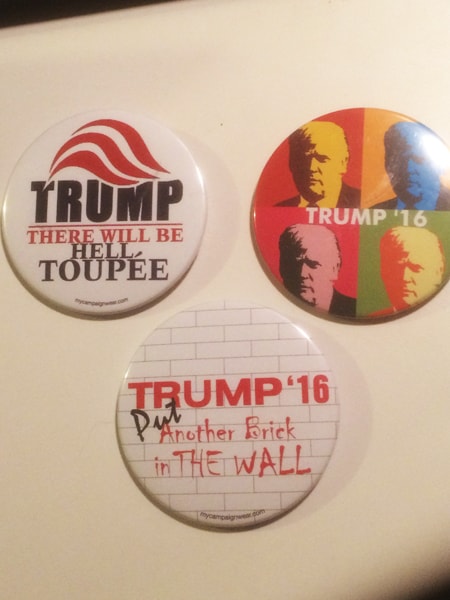 Some of the buttons for sale at the rally