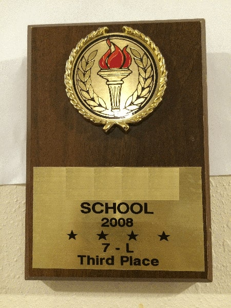 The school awarded plaques at the end of the year for top grades.