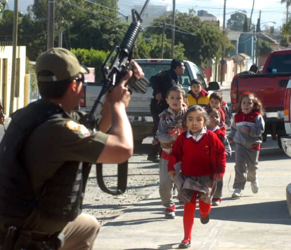 Police Fight Criminals in the Streets of Mexico