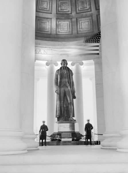 Statue of Thomas Jefferson flanked by Marine Honor Guards