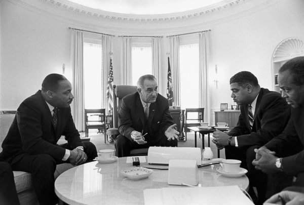 Martin Luther King Jr. meets with President Lyndon B. Johnson