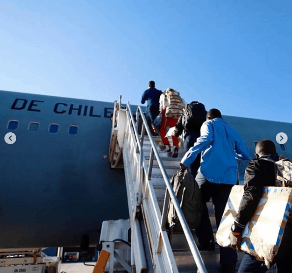 Haitians Boarding Plane Leaving Chile