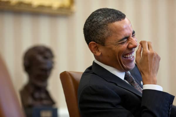 President Barack Obama laughs