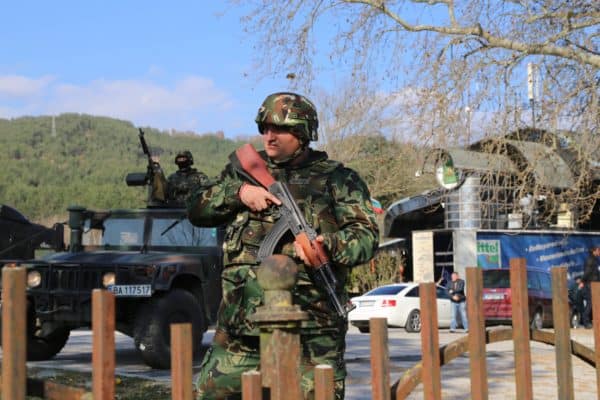 Bulgarian soldiers guard at the Zlatarevo checkpoint