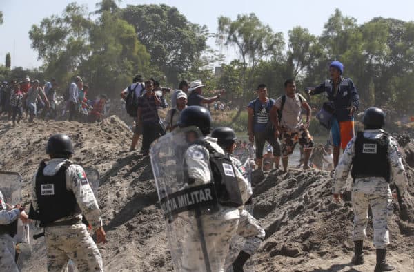Mexican National Guards stationing along the bank of the Suchiate River to prevent Central American migrants from breaking through