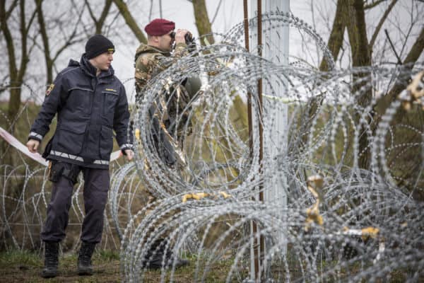 Slovenian Police Patrol Border Fence