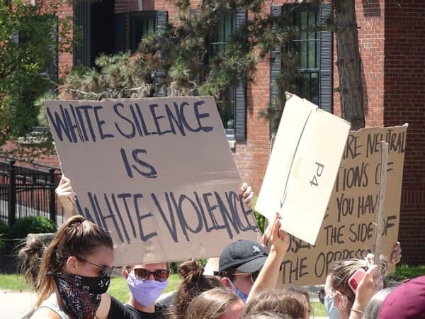 A George Floyd protest in East Lansing, MI White Silence is White Violence