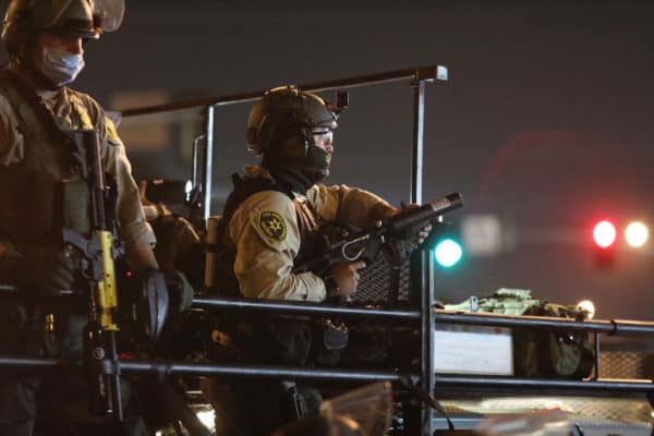 LA Riot Cops Clash with Protestors