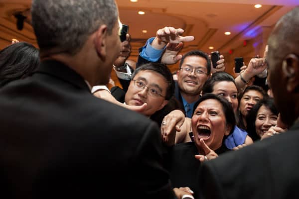 President Barack Obama greets people in the audience after delivering the keynote address at the Asian Pacific American Institute for Congressional Studies 18th Annual Gala Dinner May 8, 2012. in Washington, District of Columbia (Credit Image: © Pete Souza / The White House / ZUMAPRESS.com)