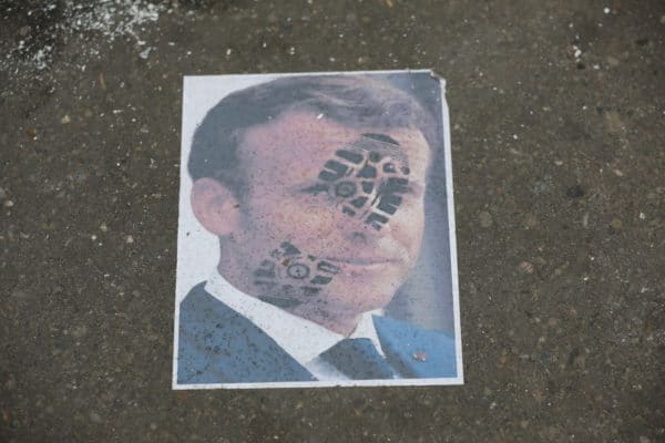 Photo of Macron with footprint