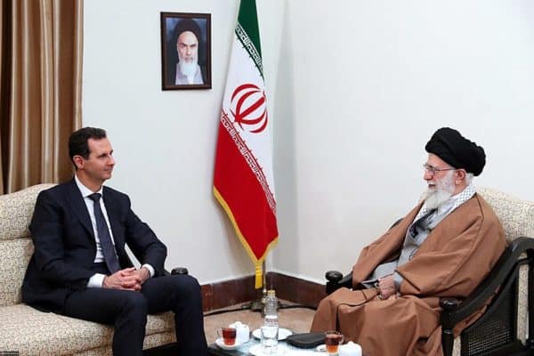 Syrian President Bashar al-Assad and Iran’s supreme leader, Ali Khamenei, in February 2019. White men? (Credit Image: Wikipedia)
