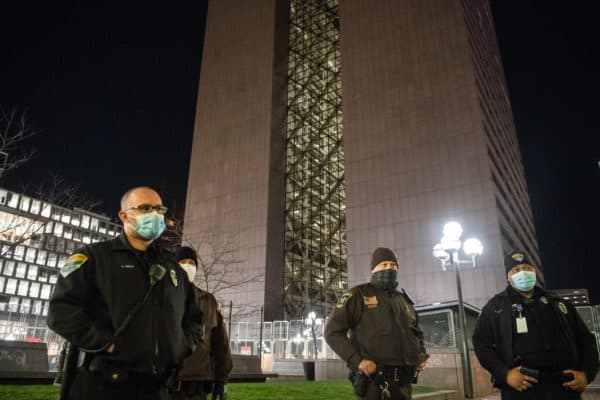 Hennepin County Sheriffs Officers examine the scene where protestors have been since the beginning of the trial outside the Hennepin County Government Center during the Derek Chauvin Trial in Minneapolis, Minnesota. (Credit Image: © imageSPACE via ZUMA Wire)