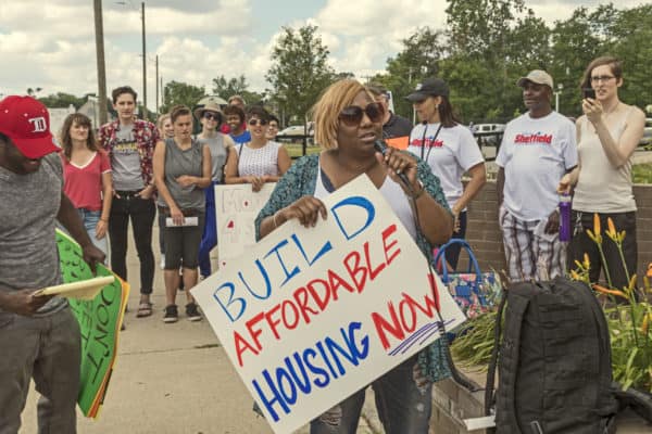 Detroit residents march through the Islandview neighborhood to protest lack of support for the city’s neighborhoods. They say long-time residents are now threatened by gentrification of parts of their community. (Credit Image: © Jim West / ZUMA Wire)