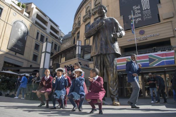 Pupils sing and dance at the Nelson Mandela Square to mark the Nelson Mandela Day, in Johannesburg, South Africa. (Credit Image: © Chen Cheng / Xinhua via ZUMA Wire)