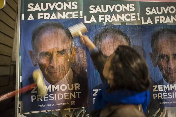 Activists from Generation Zemmour (GZ) put up campaign posters. (Credit Image: © Maxppp via ZUMA Press)