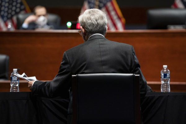 Attorney General Merrick Garland looks at still images of a video from the January 6 attack on the Capitol during a House Judiciary Committee oversight hearing of the Department of Justice on Thursday, October 21, 2021 at Capitol Hill in Washington, D.C (Credit Image: © Greg Nash – Pool Via Cnp / CNP via ZUMA Press Wire)