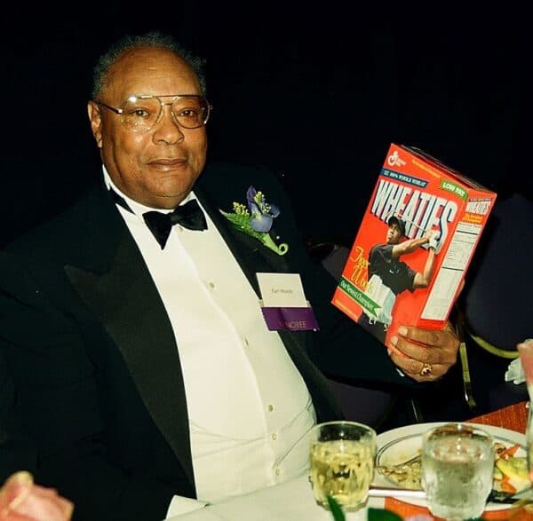 Earl Woods Holding a Tiger Woods Wheaties Box