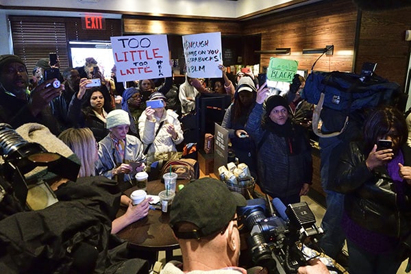 Protesters gather inside the Starbucks location in Center City Philadelphia, PA on April 15, 2018 where days earlier two black men were arrested. (Credit Image: © Bastiaan Slabbers/NurPhoto via ZUMA Press)