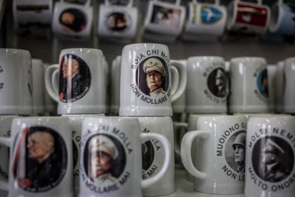 Devotional objects of the former Italian dictator Benito Mussolini and fan articles of fascism are sold in a store in Predappio, where Mussolini is buried. Italy will elect a new government on Sept. 25, 2022, with Giorgia Meloni’s post-fascist ”Fratelli d’Italia” party expected to win. (Credit Image: © Oliver Weiken/dpa via ZUMA Press)